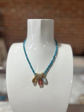 Load image into Gallery viewer, TOVA turquoise beaded necklace with Gold rings and stones
