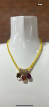 Load image into Gallery viewer, TOVA yellow beaded necklace with gold rings and stones
