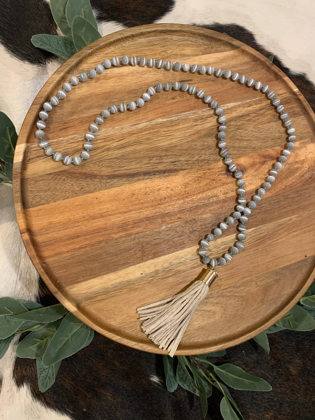Grey bead necklace with tassel